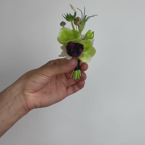 FDK Florals boutenniere complete with black ribbon and two pins.

Floral selection is dependent on seasonal stems supplied by our Hudson Valley growers and wholesale partners.